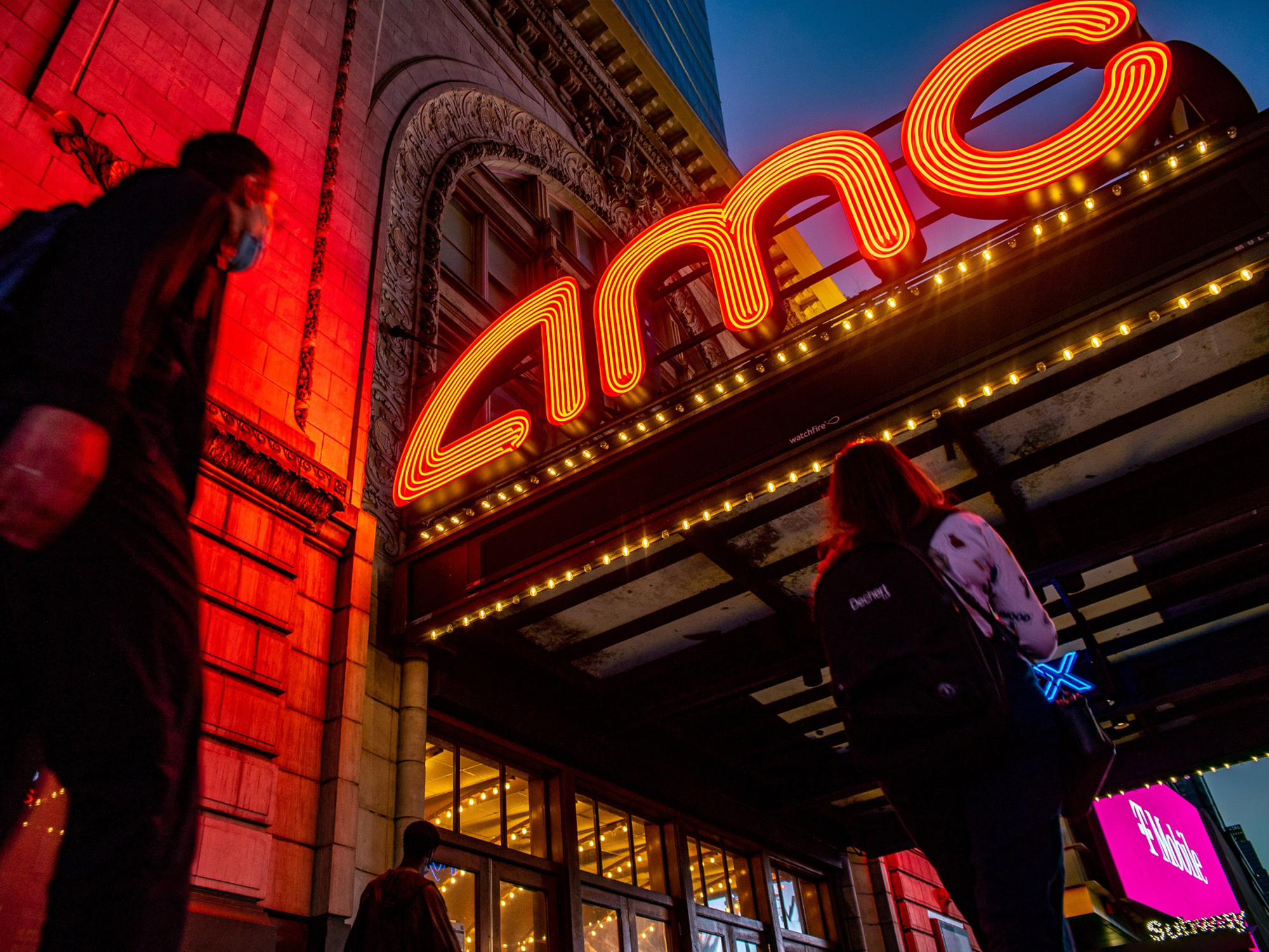 Picture of people heading into AMC Theatres